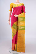 Pure Silk Rani Pink Kanjivaram Saree with Plain Body and Temple Border.  displayed on a mannequin