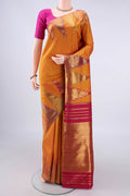 Pure Silk Mustard Kanjivaram Saree with Plain Body and Temple Border.  displayed on a mannequin