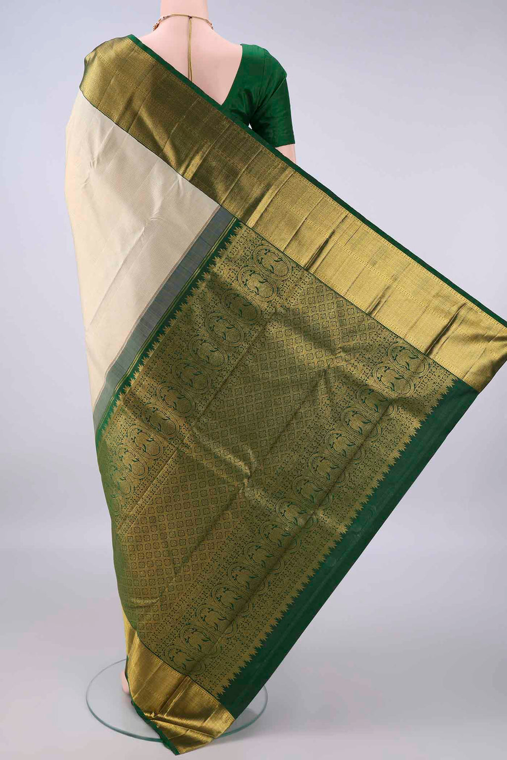 Flat view of Pure Silk Cream Kanchipuram Saree with Checked design on the body and Zari Border. 