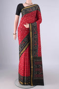Pure Silk Red Rajkot Patola Saree with Pure Ikat on the body and Ikat Border.  displayed on a mannequin