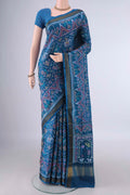 Pure Silk Blue Rajkot Patola Saree with Pure Ikat on the body and Ikat Border.  displayed on a mannequin