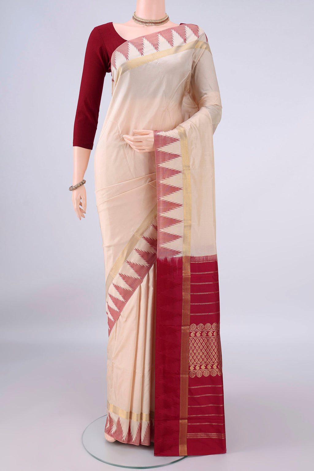 Pure Silk Cream Bangalore - kadyal Saree with Plain Body and Temple Border.  displayed on a mannequin