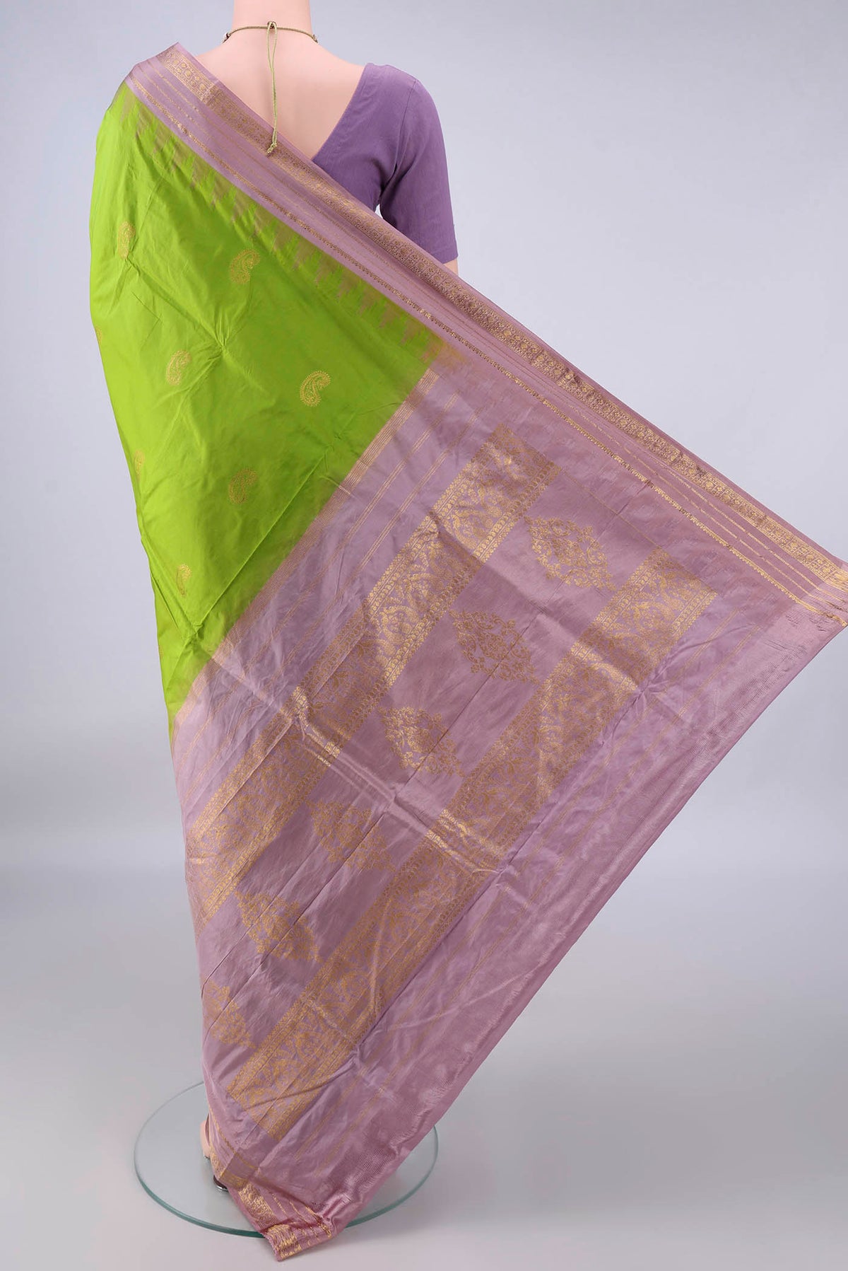 Flat view of Pure Silk Green Bangalore - kadyal Saree with Zari Butta on the body and Zari Border. 