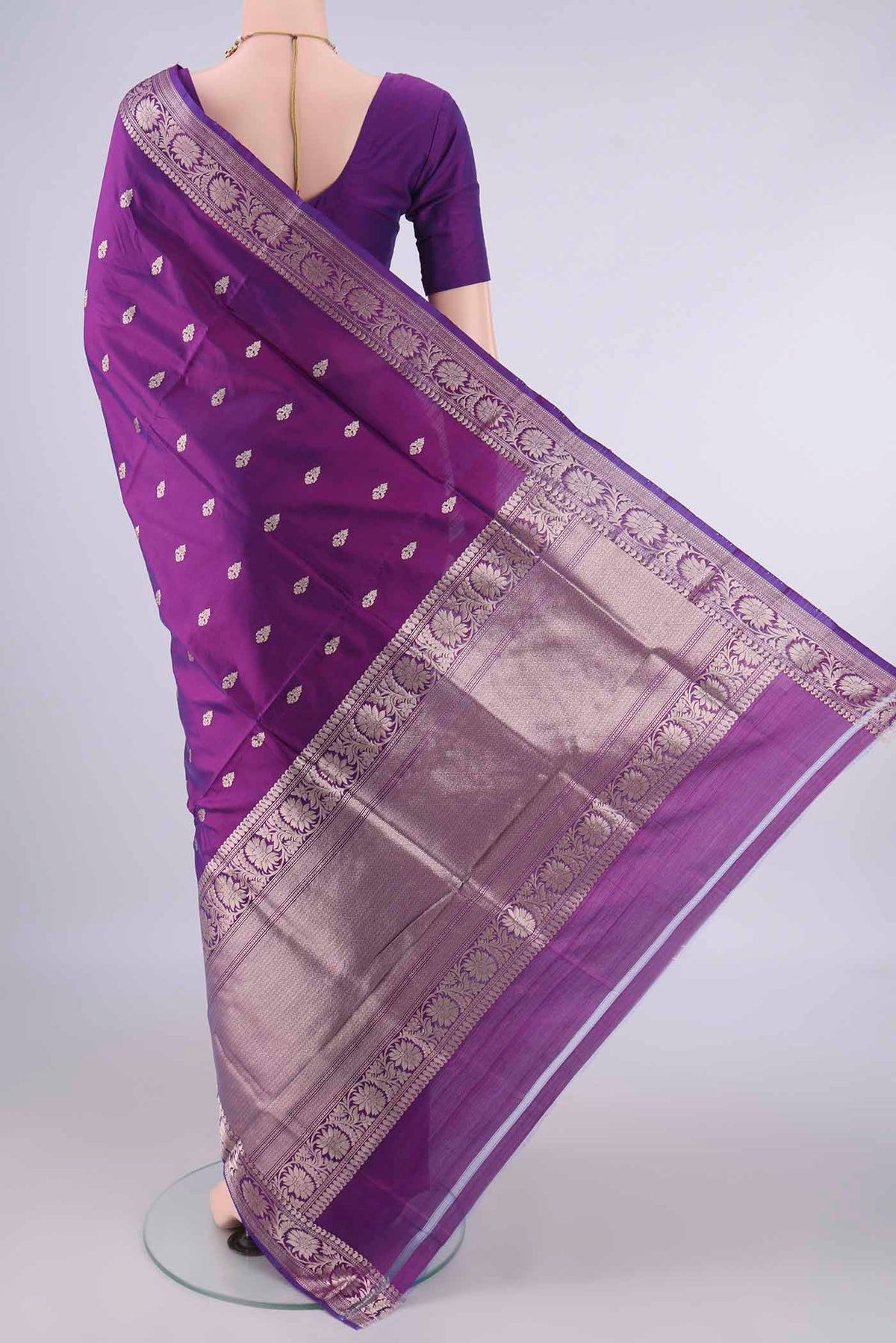 Flat view of Pure Silk Purple Banarasi Katan Saree with Zari Butta on the body and Zari Border. 