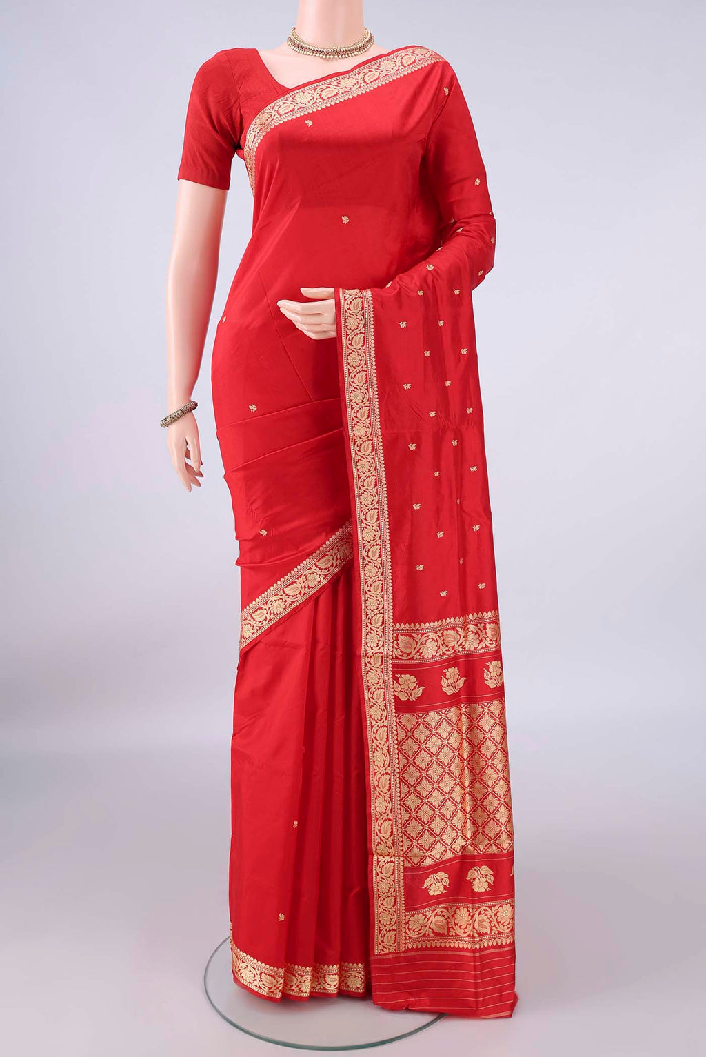 Pure Silk Red Banarasi Katan Saree with Thread Butta on the body and Thread Border.  displayed on a mannequin