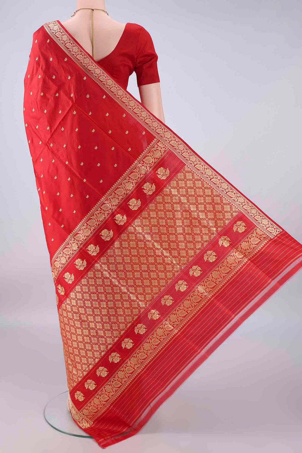 Flat view of Pure Silk Red Banarasi Katan Saree with Thread Butta on the body and Thread Border. 