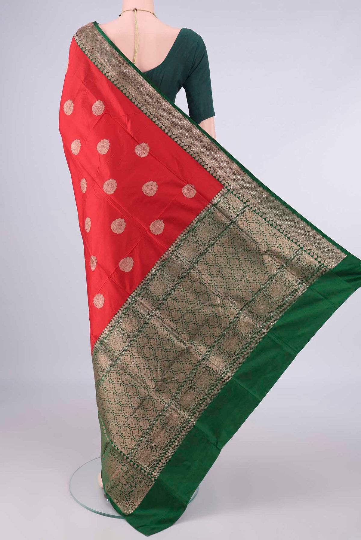 Flat view of Pure Silk Red Banarasi Katan Saree with Zari Butta on the body and Zari Border. 