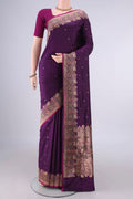 Pure Silk Purple Banarasi Katan Saree with Zari Butta on the body and Zari Border.  displayed on a mannequin
