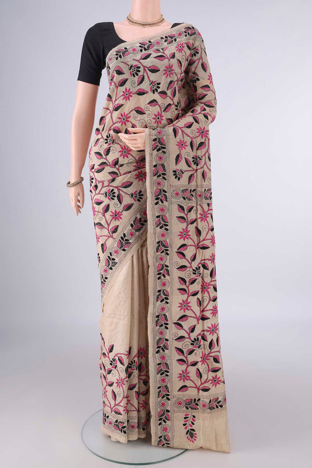 Beige Tussar Saree with Kantha Work on the body and Thread Border.  displayed on a mannequin