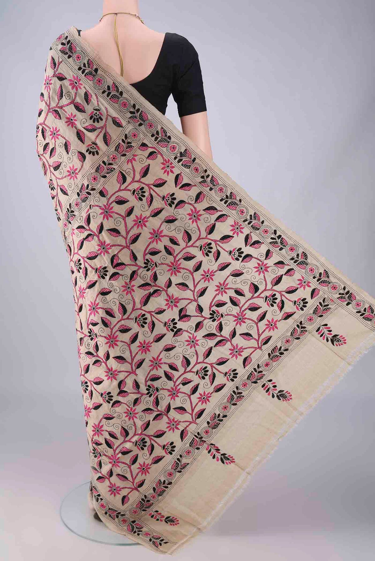 Flat view of Beige Tussar Saree with Kantha Work on the body and Thread Border. 