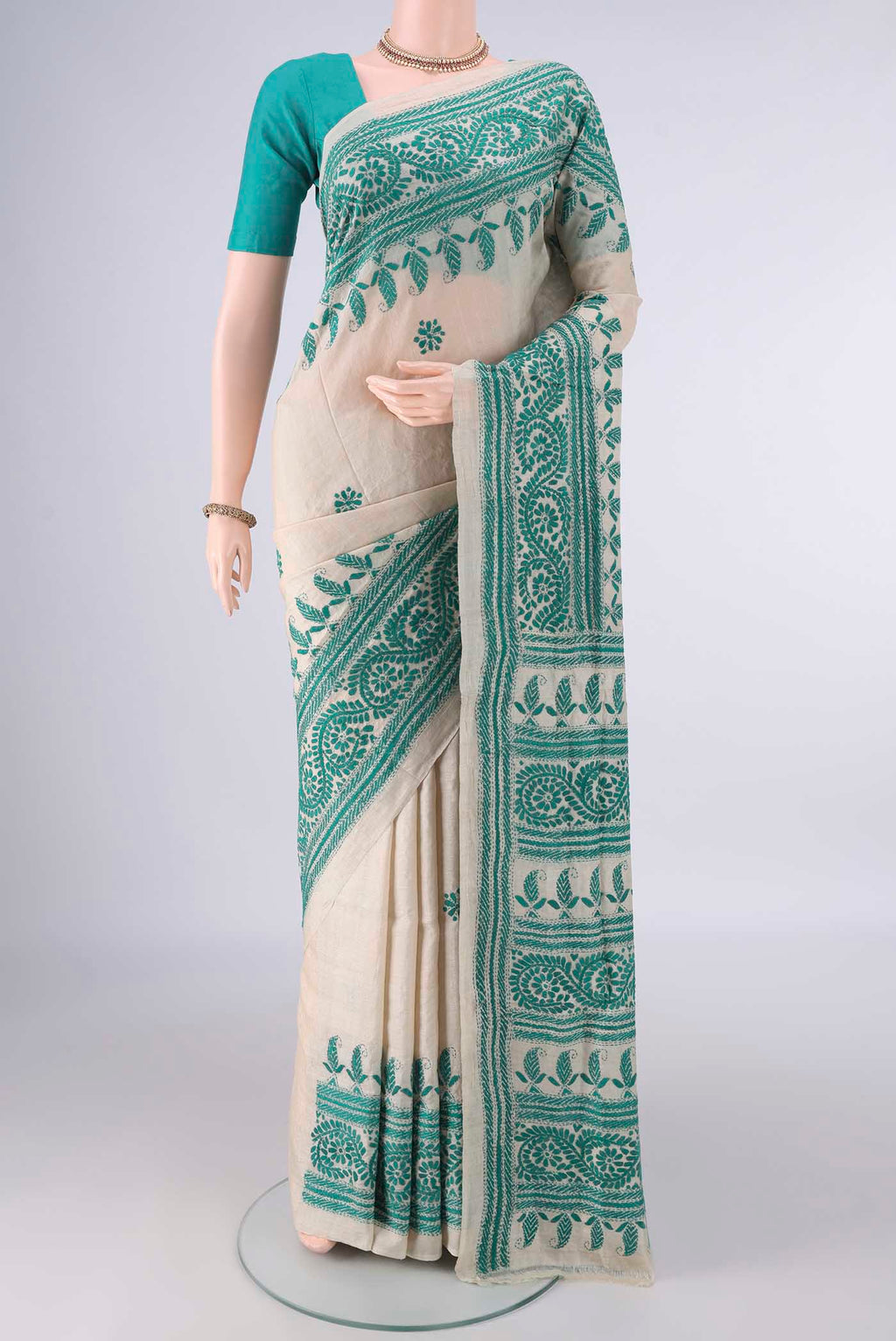 Beige Tussar Saree with Kantha Work on the body and Thread Border.  displayed on a mannequin