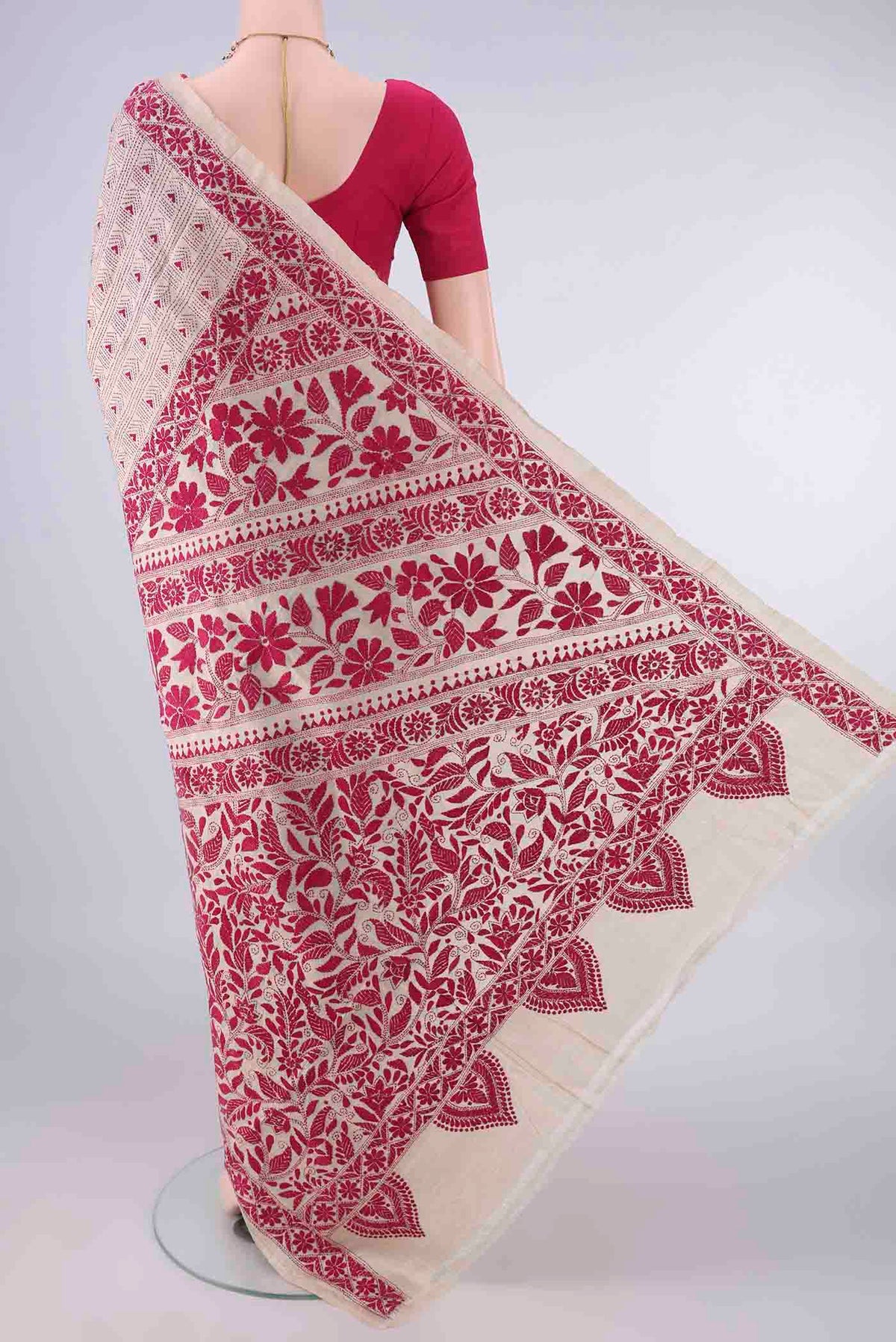 Flat view of Beige Tussar Saree with Kantha Work on the body and Thread Border. 