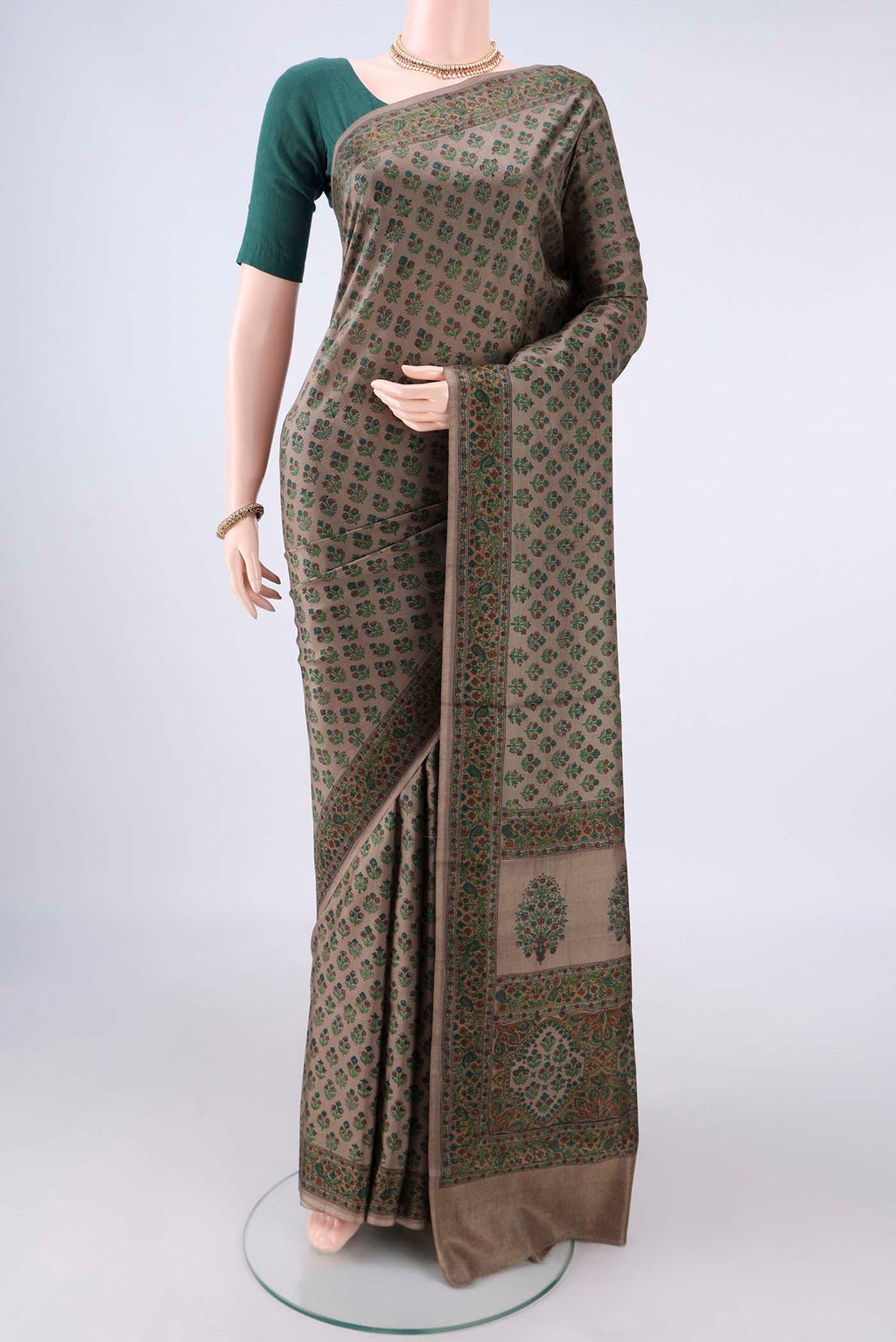 Pure Silk Dark Beige Printed Saree with Printed design on the body and Printed Border.  displayed on a mannequin