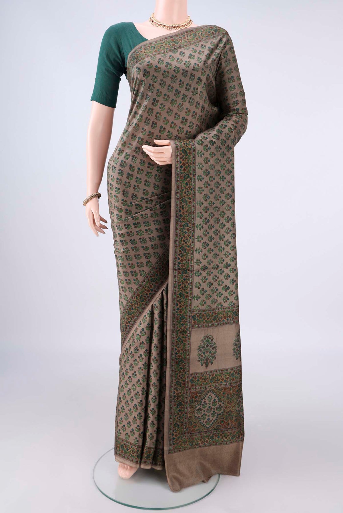Pure Silk Dark Beige Printed Saree with Printed design on the body and Printed Border.  displayed on a mannequin