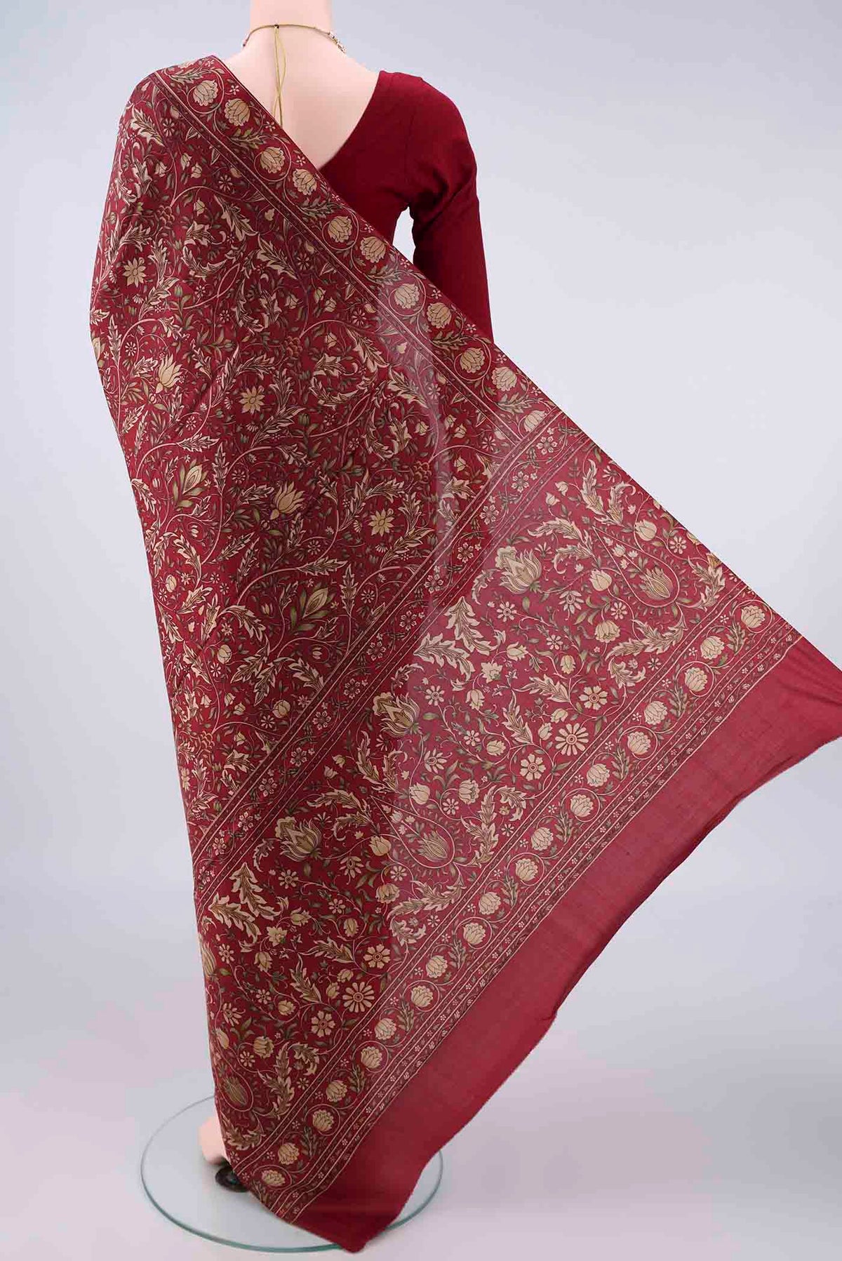 Flat view of Pure Silk Maroon Printed Saree with Printed design on the body and Printed Border. 