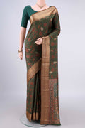 Pure Silk Green Printed Saree with Printed design on the body and Zari Border.  displayed on a mannequin