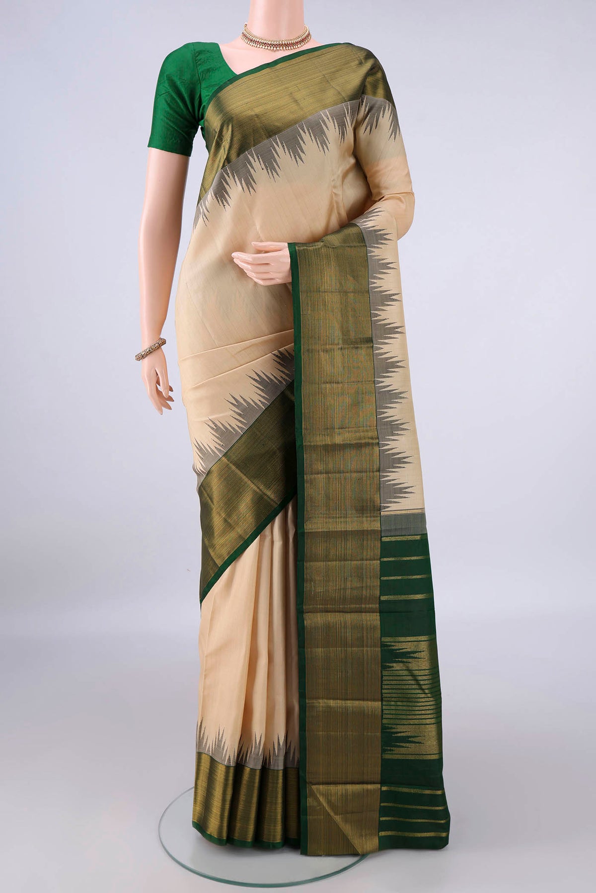 Pure Silk Sandal Kanjivaram Saree with Plain Body and Temple Border.  displayed on a mannequin