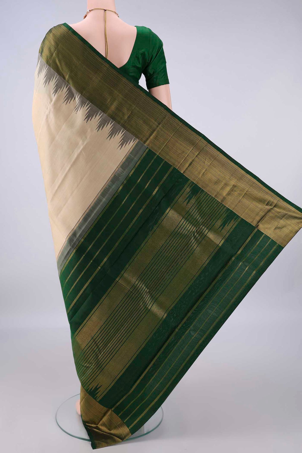 Flat view of Pure Silk Sandal Kanjivaram Saree with Plain Body and Temple Border. 
