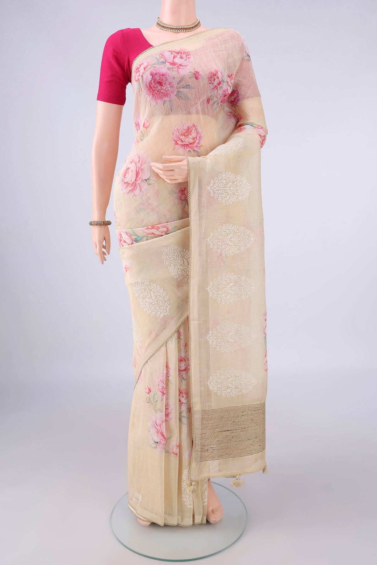 Sandal Linen Saree with Floral Print on the body and Without Border.  displayed on a mannequin