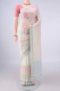 Cream Linen Saree with Embroidery on the body and Thread Border.  displayed on a mannequin