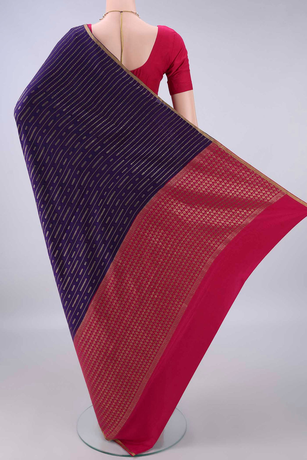Flat view of Navy Blue Mysore Crepe Saree with Stripes on the body and Zari Border. 