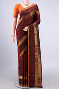 Pure Silk Brown Dual Tone Kanjivaram Saree with Zari Butta on the body and Zari Border.  displayed on a mannequin