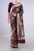 Pure Silk Burgundy Banarasi Saree with Zari Brocade on the body and Zari Border.  displayed on a mannequin