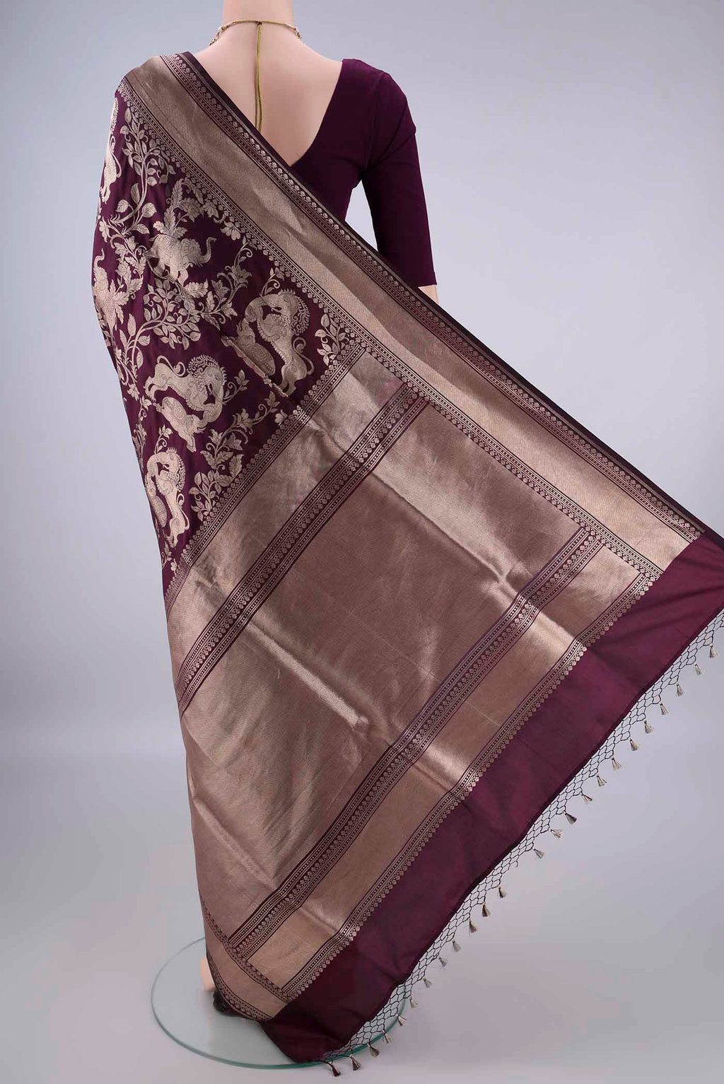 Flat view of Pure Silk Burgundy Banarasi Saree with Zari Brocade on the body and Zari Border. 
