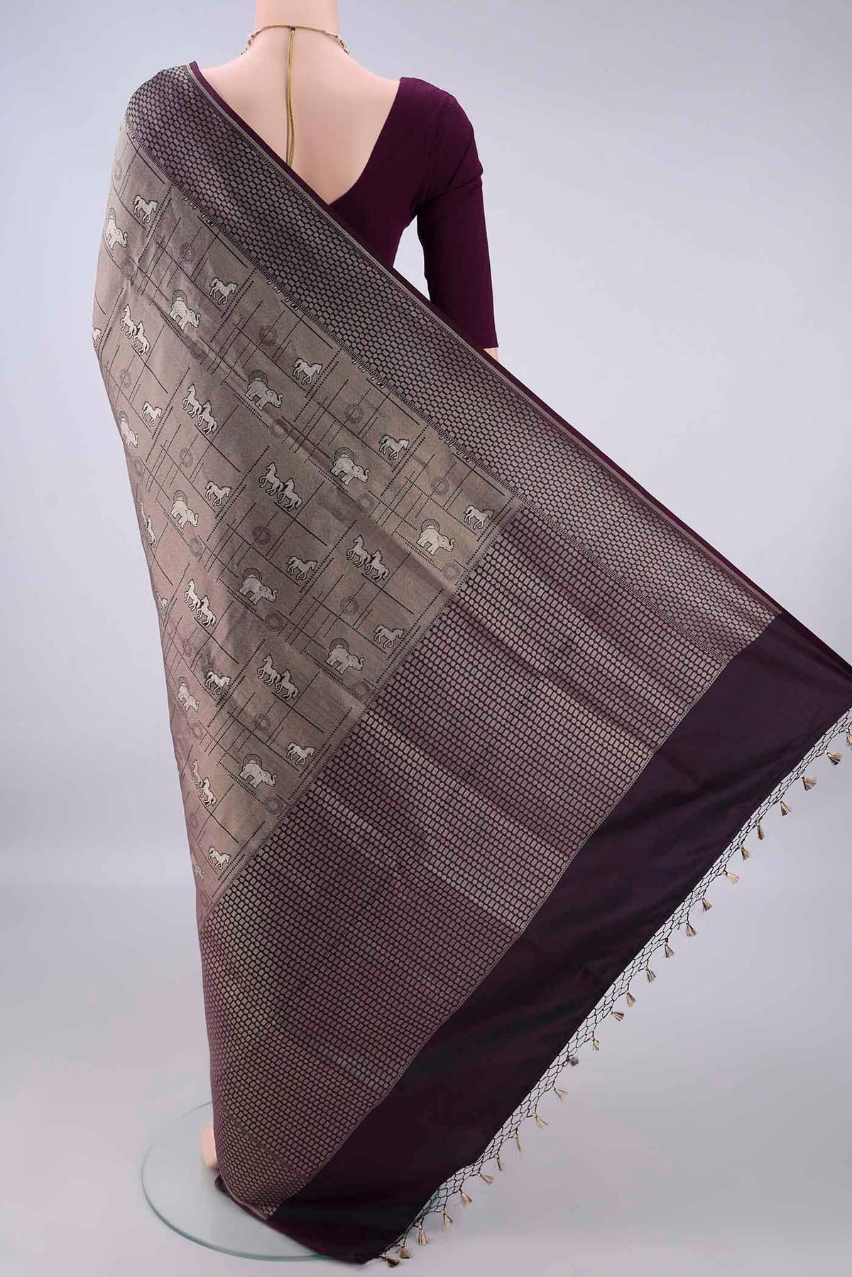 Flat view of Pure Silk Grey Banarasi Saree with Zari Butta on the body and Zari Border. 
