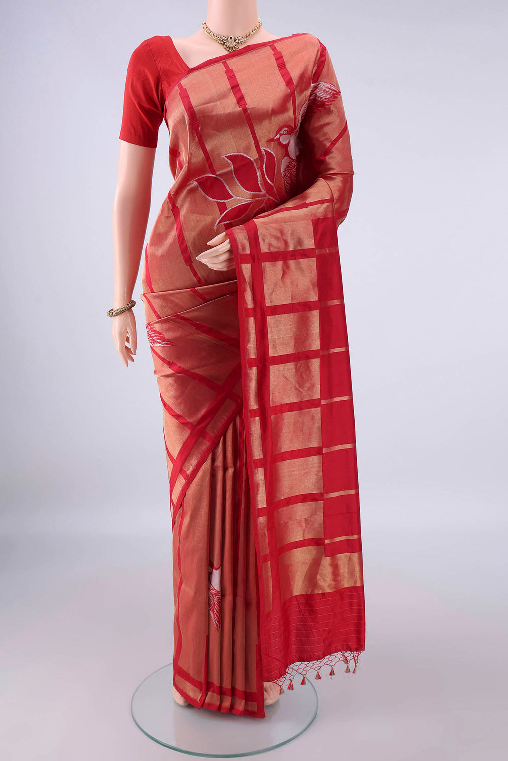 Pure Silk Red Banarasi Saree with Zari Butta on the body and Zari Border.  displayed on a mannequin