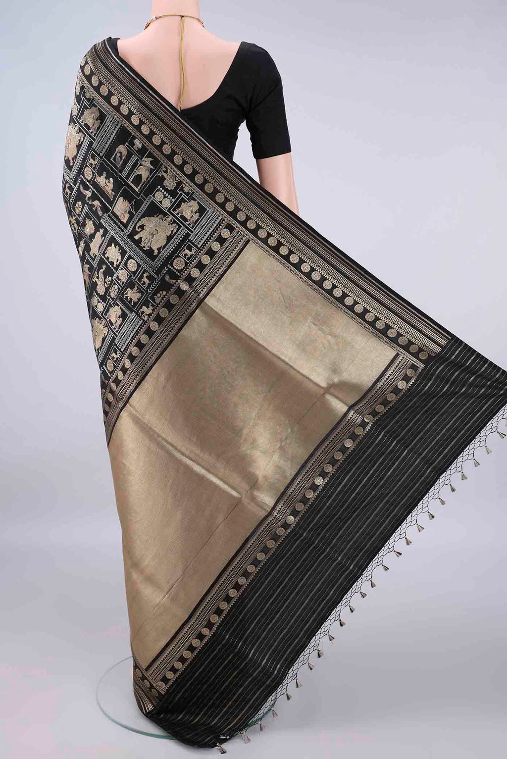 Flat view of Pure Silk Black Banarasi Saree with Zari Butta on the body and Zari Border. 