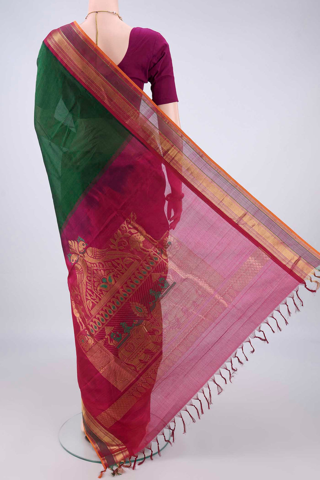 Flat view of Bottle Green Silk Cotton Saree with Plain Body and Zari Border. 