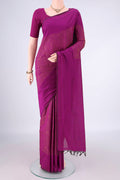 Magenta Blended Poly Cotton Saree with Jacquard design on the body and Thread Border.  displayed on a mannequin