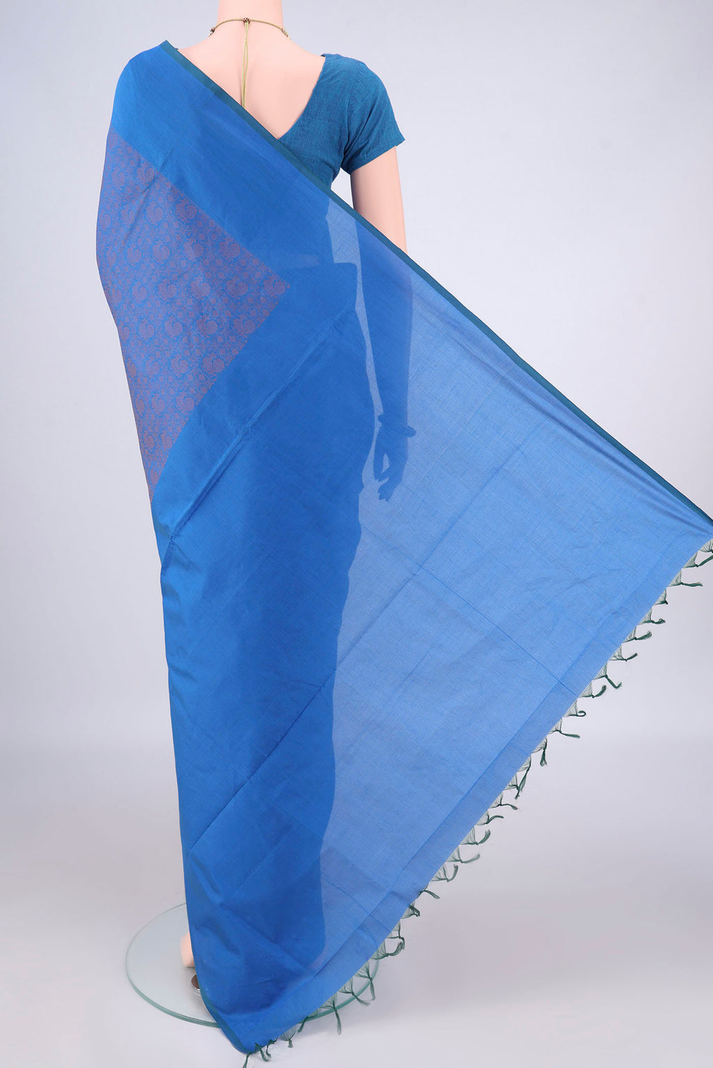 Flat view of Blue Blended Poly Cotton Saree with Jacquard design on the body and Plain Border. 