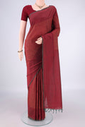 Rust Blended Poly Cotton Saree with Jacquard design on the body and Thread Border.  displayed on a mannequin