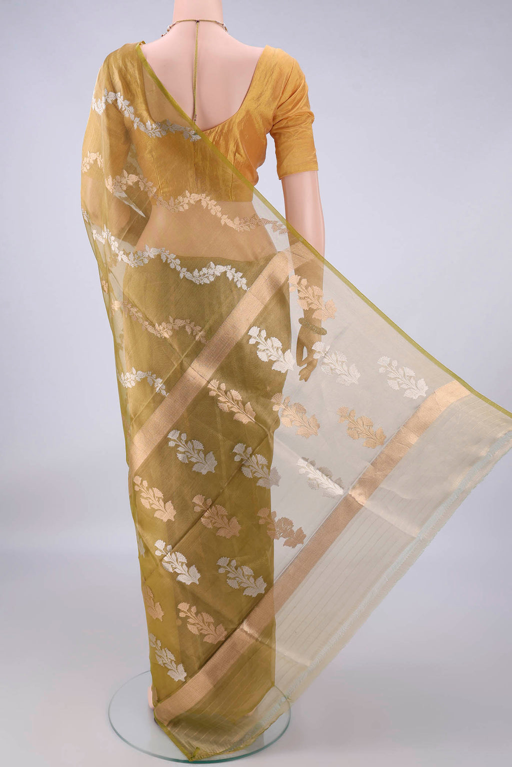 Flat view of Light Green Dual Tone Organza Saree with Fancy on the body and Plain Border. 