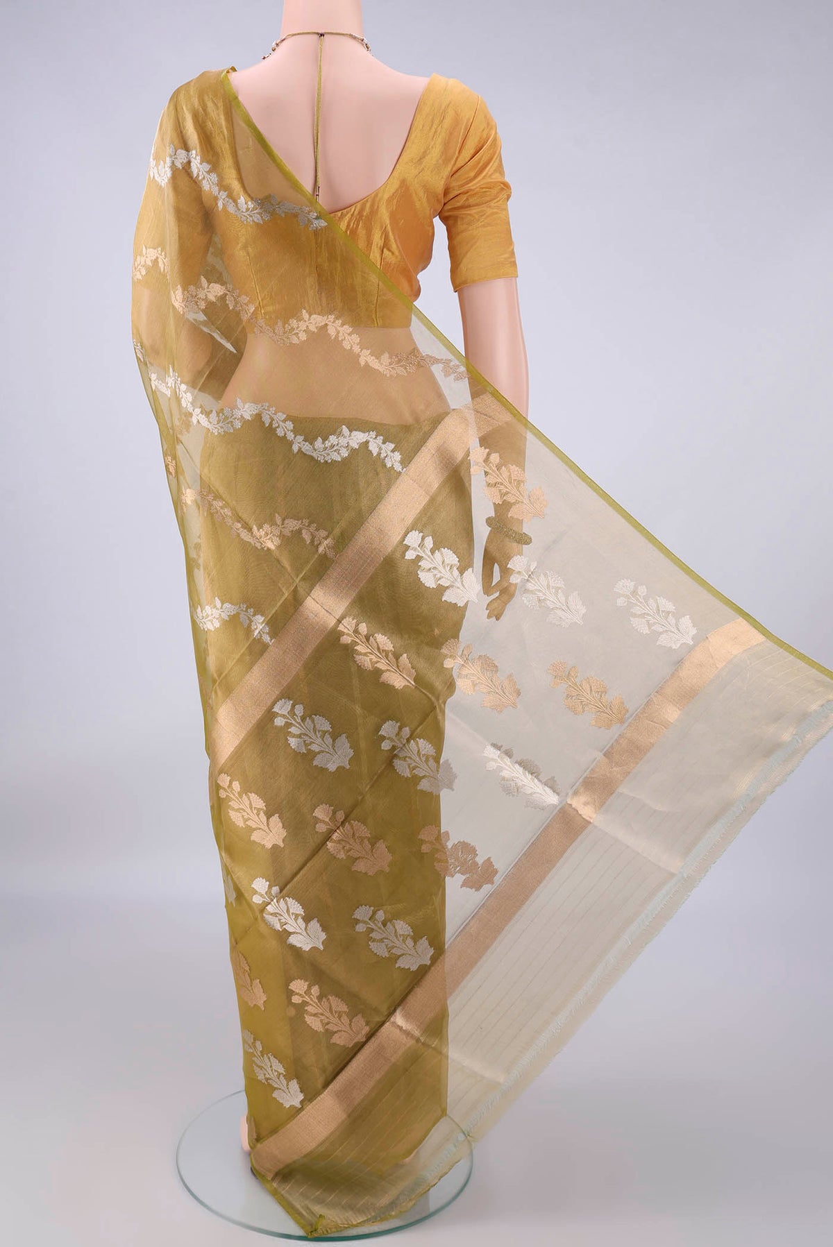 Flat view of Light Green Dual Tone Organza Saree with Fancy on the body and Plain Border. 