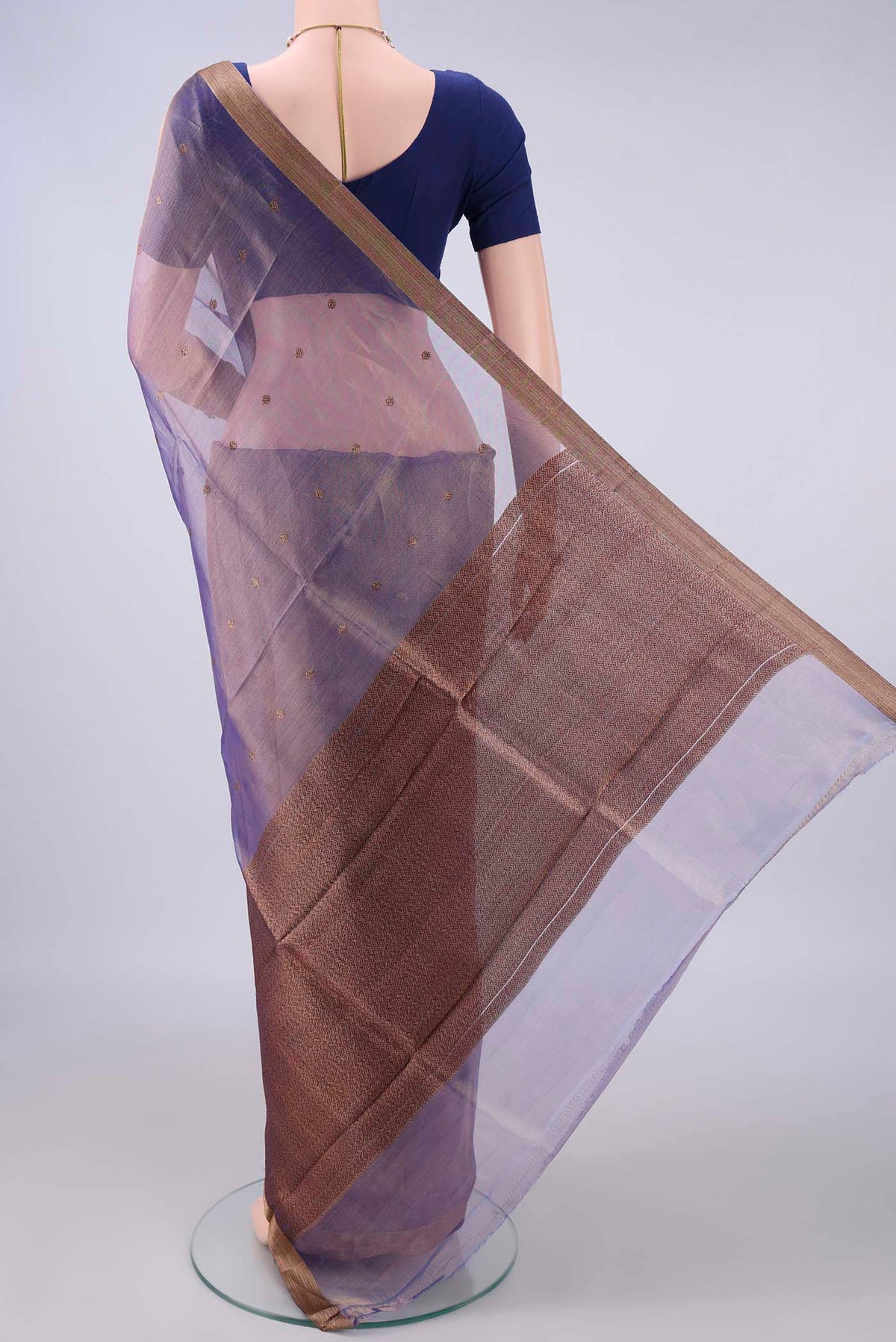Flat view of Violet Dual Tone Organza Saree with Zari Butta on the body and Zari Border. 