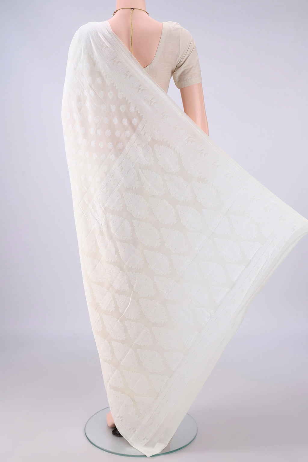Flat view of Off White Blended Banarasi Georgette Saree with Thread Butta on the body and Thread Border. 