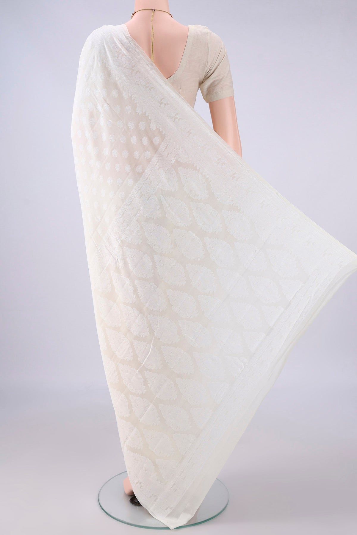 Flat view of Off White Blended Banarasi Georgette Saree with Thread Butta on the body and Thread Border. 