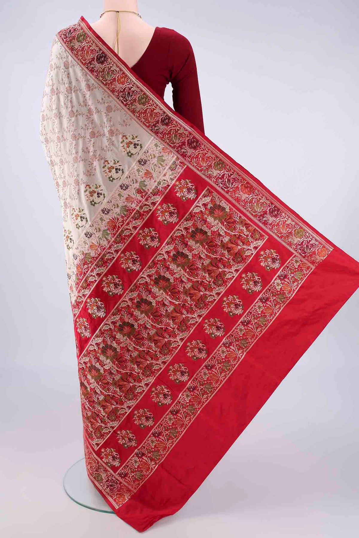 Flat view of Beige Banarasi Jamavar Saree with Thread Brocade on the body and Zari Border. 