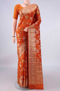 Pure Silk Orange Banarasi Raw Saree with Zari Brocade on the body and Zari Border.  displayed on a mannequin