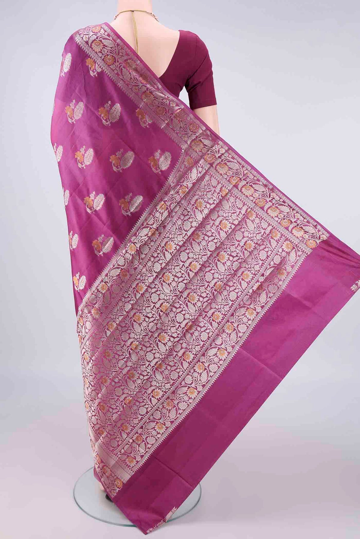 Flat view of Pure Silk Pink Banarasi Raw Saree with Zari And Thread Butta on the body and Zari Border. 