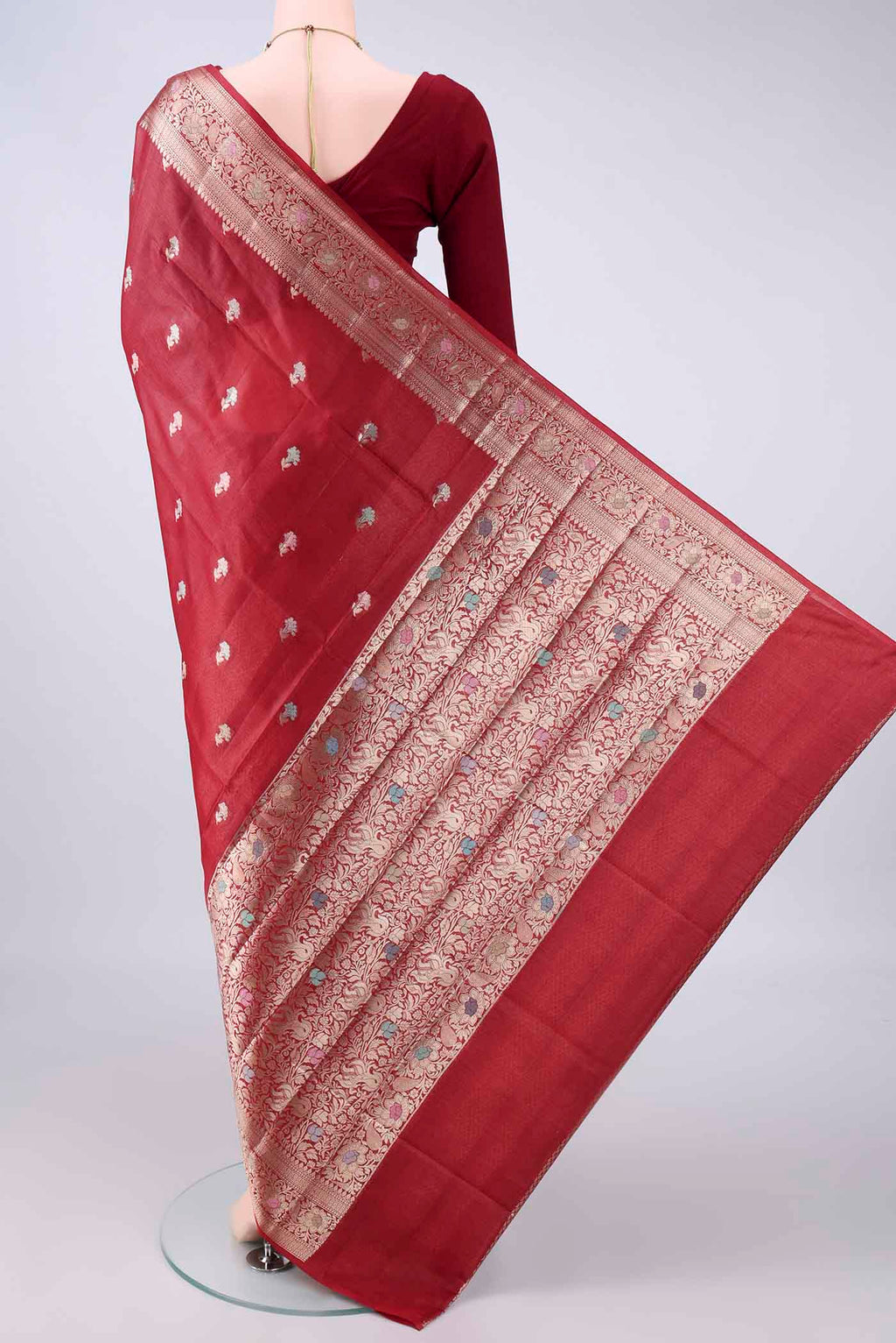 Flat view of Rust Banarasi Raw Saree with Zari And Thread Butta on the body and Zari And Thread Border. 