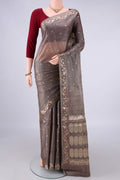 Davys Grey Banarasi Tussar Saree with Zari And Thread Butta on the body and Zari And Thread Border.  displayed on a mannequin