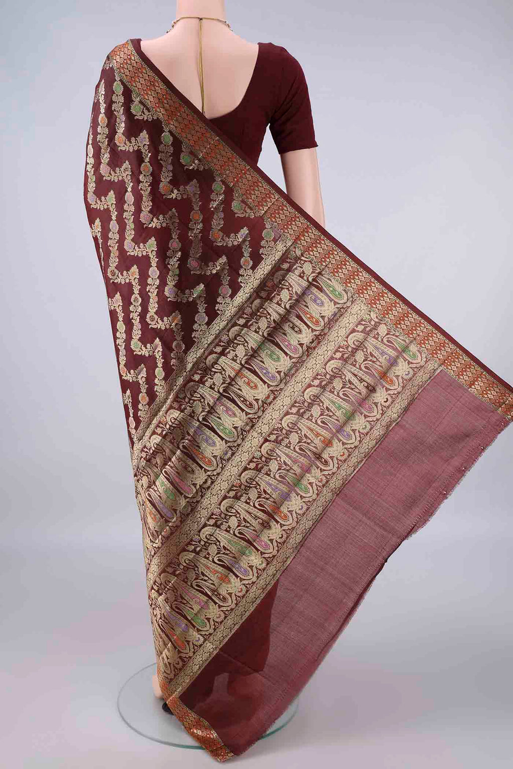 Flat view of Brown Banarasi Tussar Saree with Zari Brocade on the body and Zari Border. 