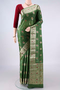 Green Banarasi Tussar Saree with Zari And Thread Butta on the body and Zari And Thread Border.  displayed on a mannequin