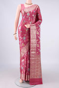 Pink Banarasi Tussar Saree with Zari And Thread Butta on the body and Zari And Thread Border.  displayed on a mannequin