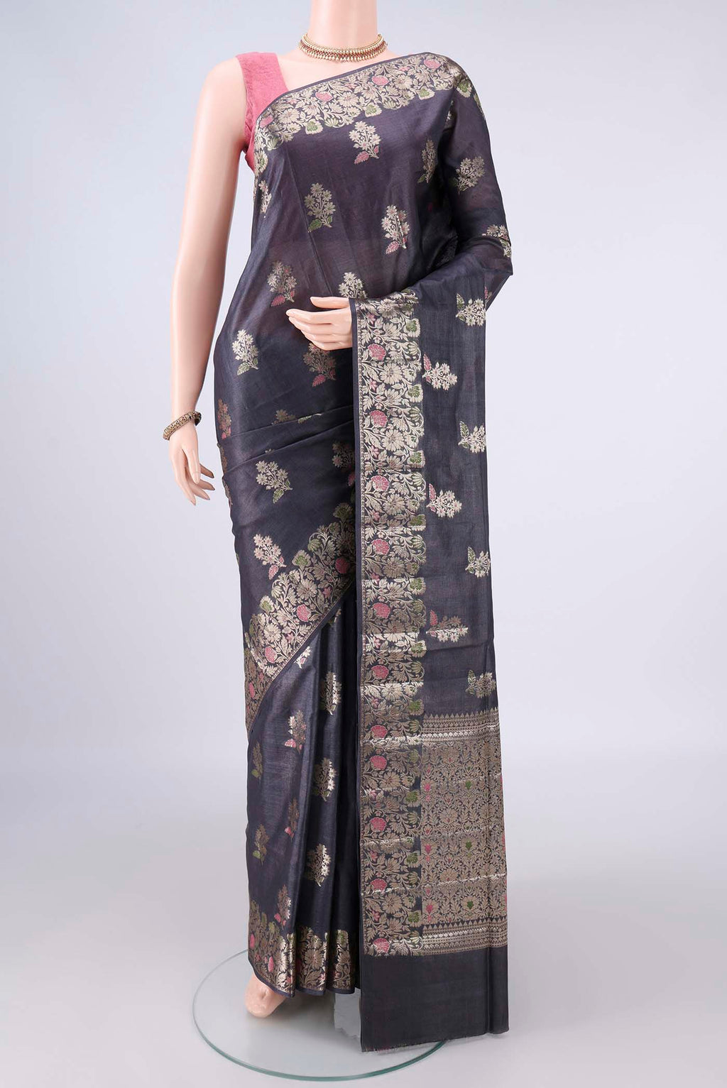 Davys Grey Banarasi Tussar Saree with Zari And Thread Butta on the body and Zari And Thread Border.  displayed on a mannequin