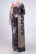 Davys Grey Banarasi Tussar Saree with Zari And Thread Butta on the body and Zari And Thread Border.  displayed on a mannequin